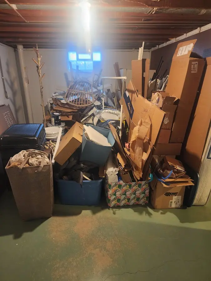 Roll-off dumpster container at job site for Yard Waste Dumpster Rental in Rendon